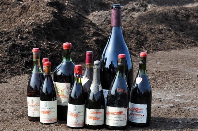 Rudy Kurniawan counterfeit wines await destruction at a Texas landfill site. Credit: Lynzey Donahue / US Marshals